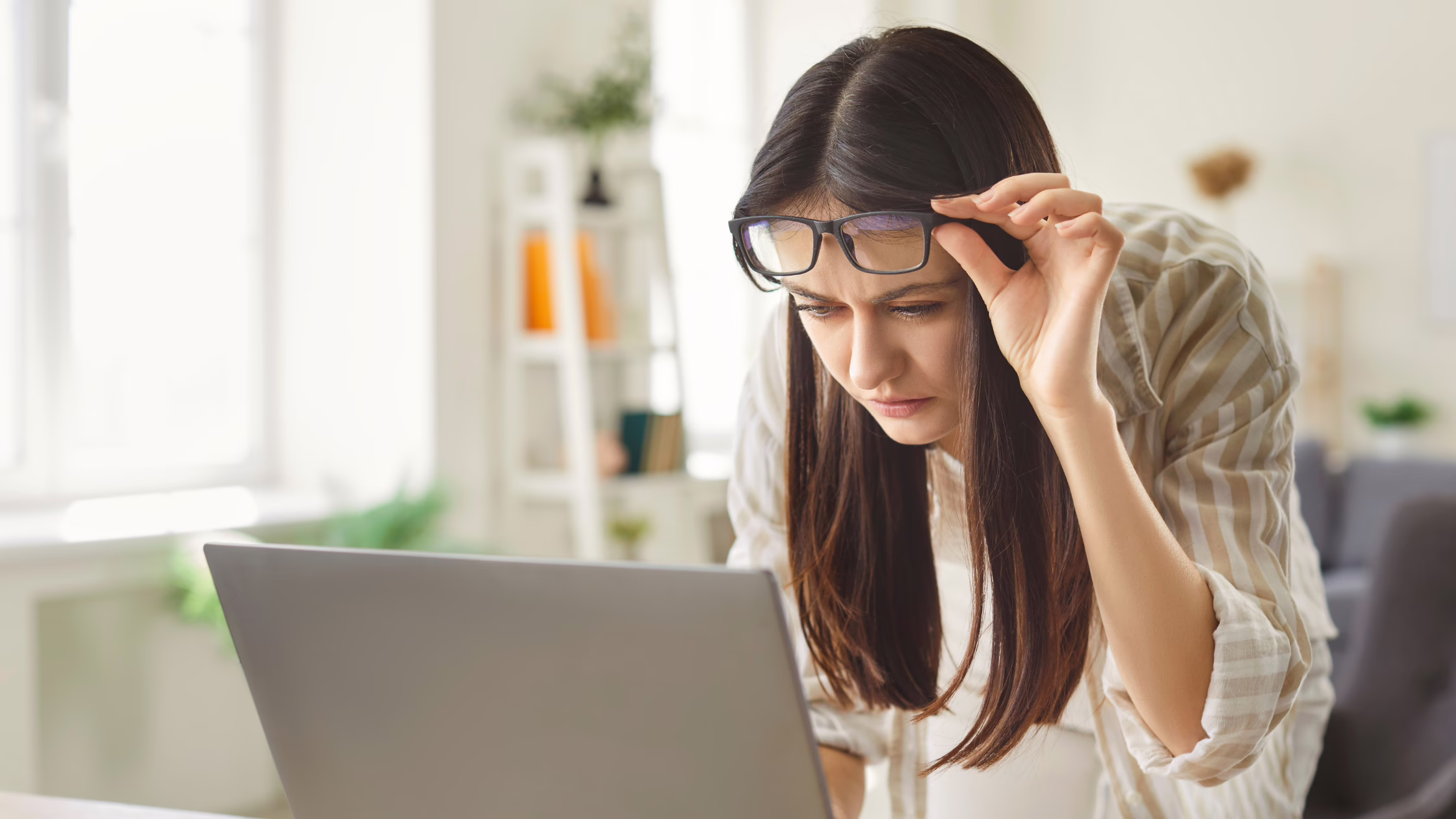 a woman Struggling reading